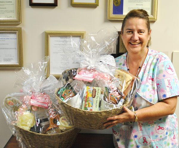 Erin Zubia Radiology Tech R M Qm At Grmc Pictured With Gift Baskets